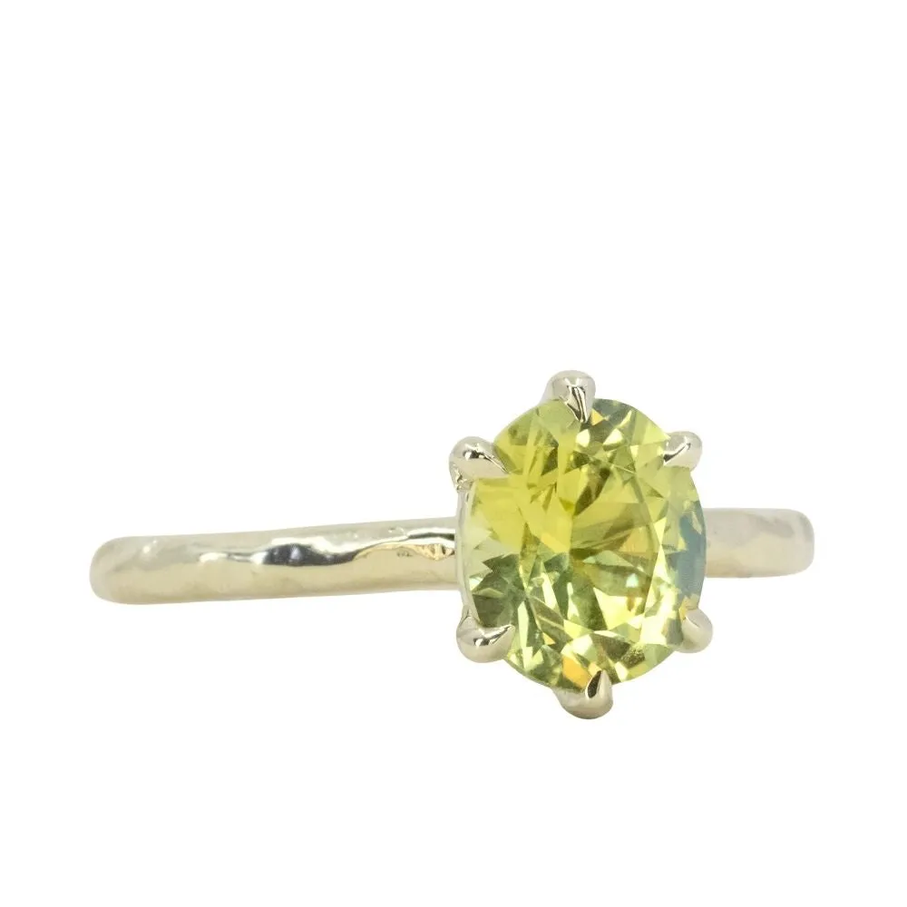 1.95ct Oval Yellow-Green Untreated Parti Nigerian Oval Sapphire Six Prong Evergreen Solitaire in 14k Green Gold